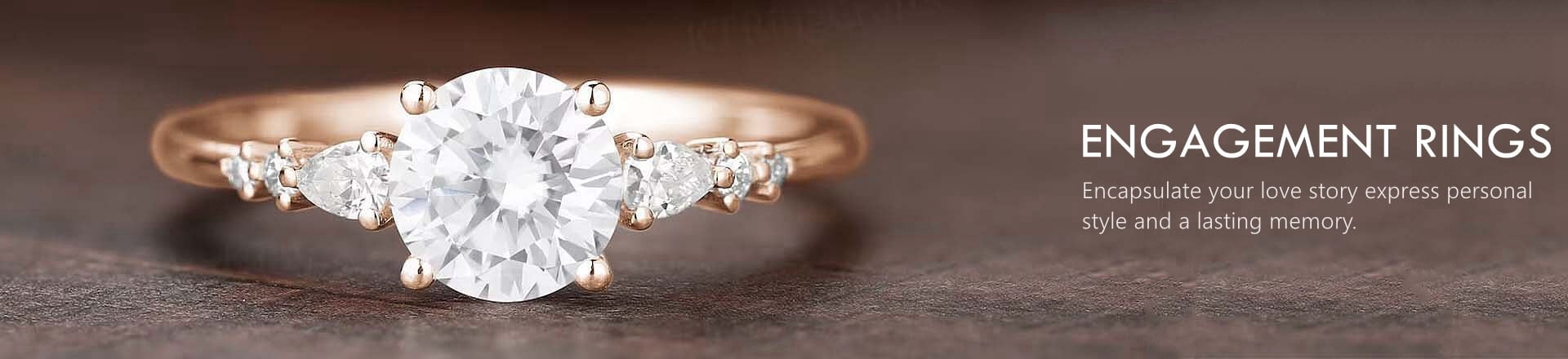 Emerald Green Engagement Rings