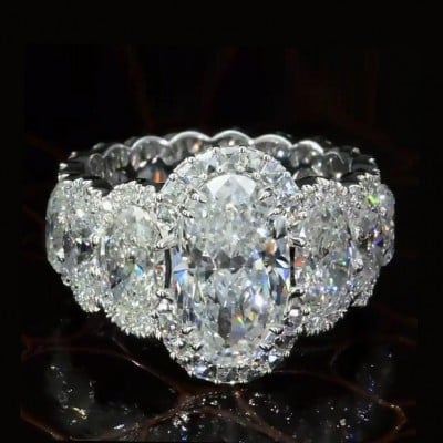Oval Cut Diamond White Halo Engagement Ring in 925 Sterling Silver