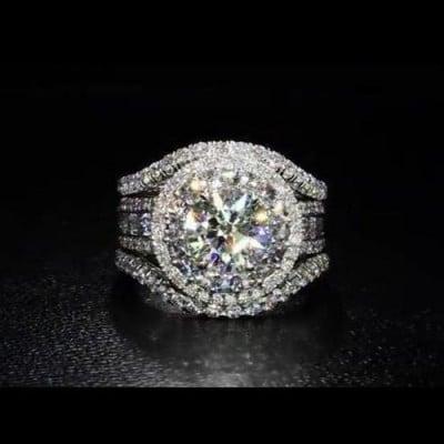 Diamond White Round Cut Halo Engagement Ring in Sterling Silver