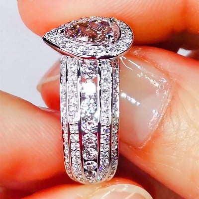 Fancy Pink Pear Cut Halo Engagement Ring in 925 Sterling Silver